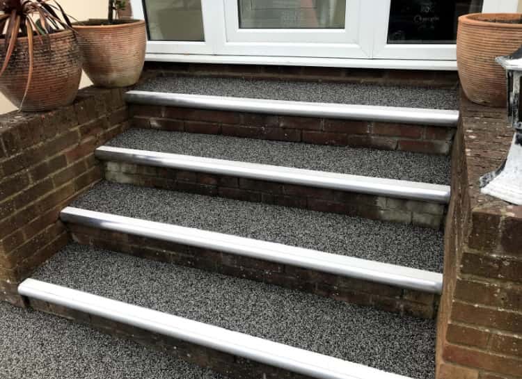 This is a photo of a Resin bound stair path carried out in York. All works done by Resin Driveways York